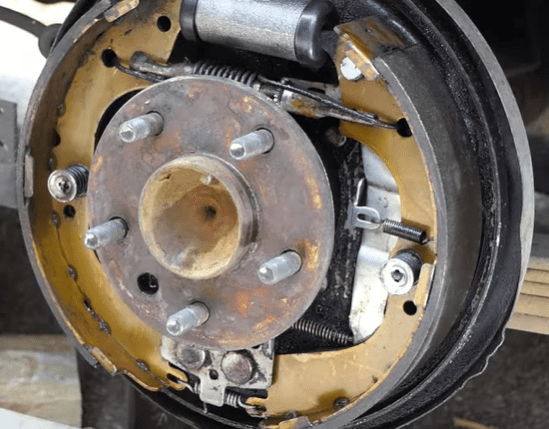 Debris between the brake pads and calipers
