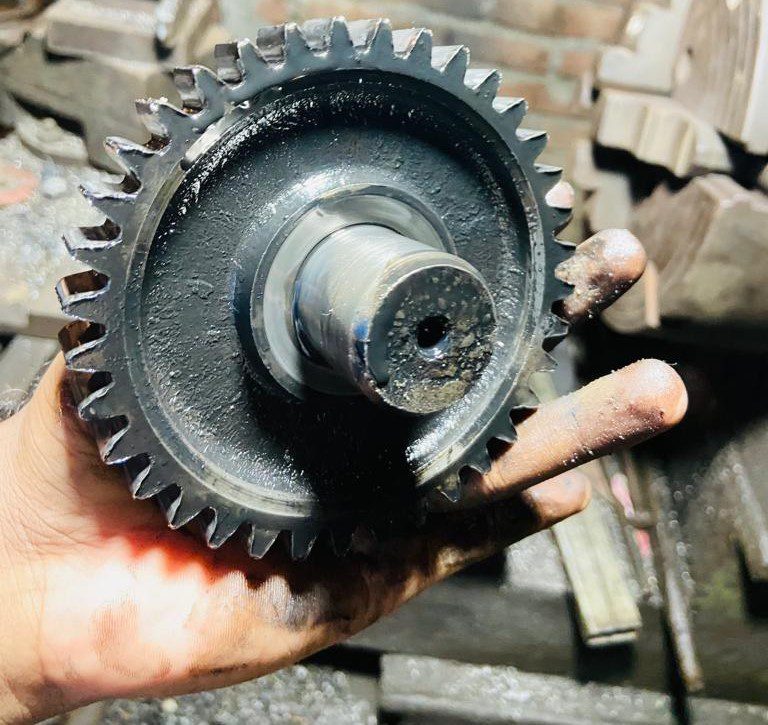 Timing belt connecting the crankshaft and camshaft and it's a real camshaft