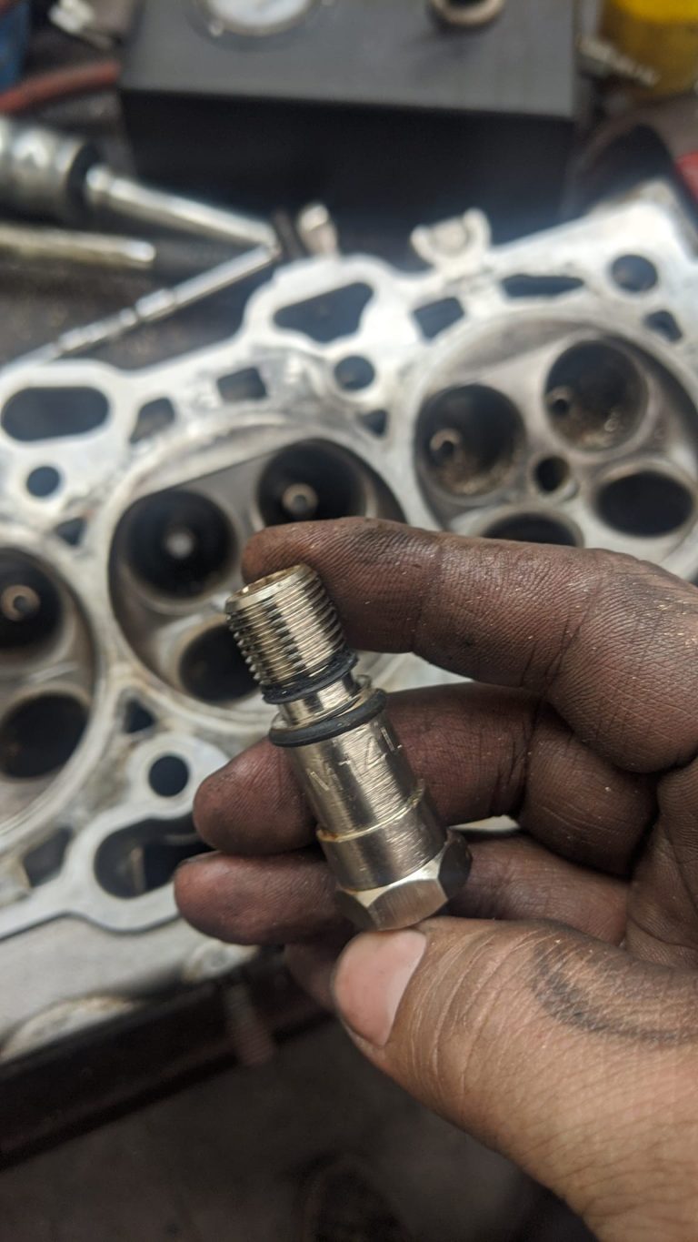 blown-out spark plugs with observation