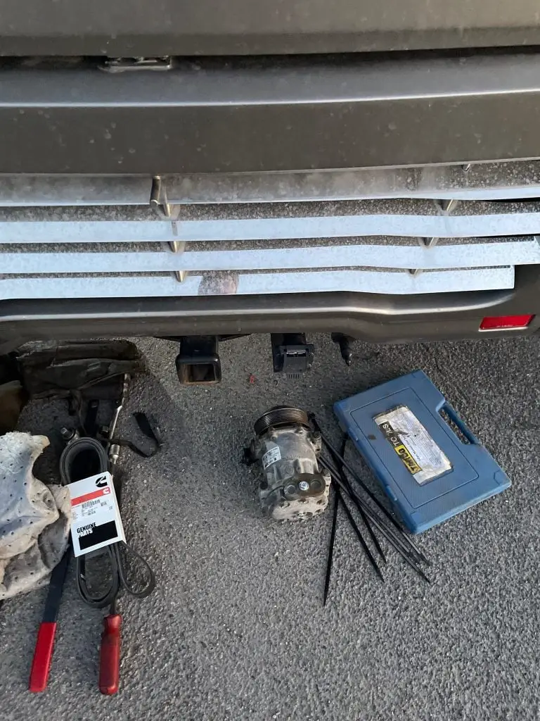 Replace AC compressor to solve car shuts off while idling with ac on