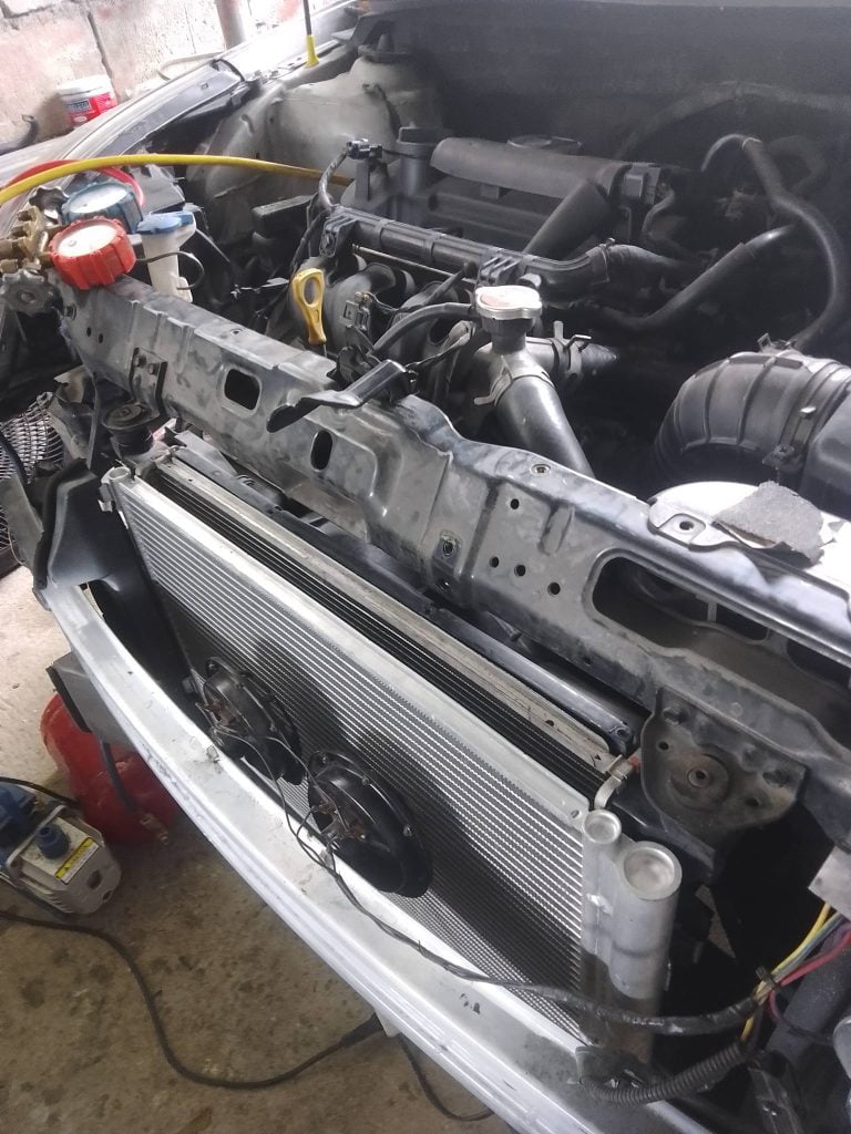Car overheat when ac on happens due to clogged radiator fins